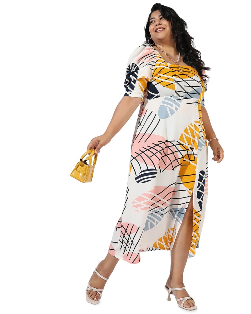Front of a model wearing a size 6XL Tropic Printed Front Slit Dress in White by Instafab Plus. | dia_product_style_image_id:298081